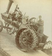Man posing on tractor