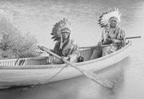 Stands and Looks Back and Hollow Horn Bear in a canoe