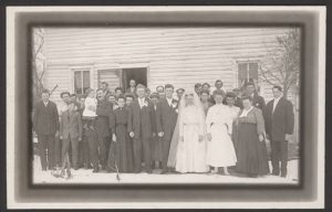 Bride and groom outside of church 