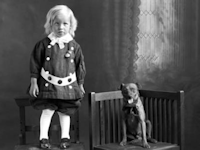 Unknown child and dog