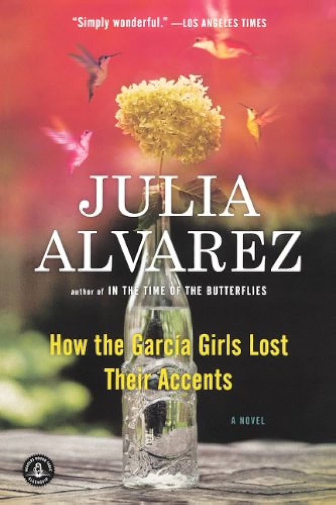 cover for How the Garcia Girls Lost Their Accents by Julia Alvarez. 
Four different colored hummingbirds fly around a flower in a glass vase
